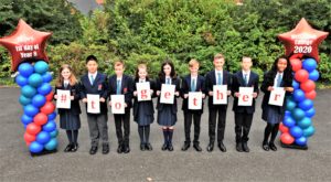 Wellington College students holding sign saying Together