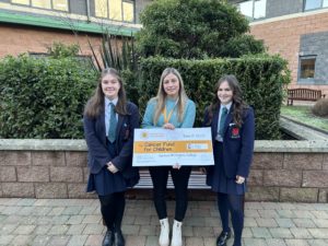 Cheque presentation to Cancer Fund for Children representative Rebecca