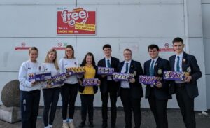 Senior prefects donating Easter Eggs to Helping Hand Charity at Belfast Royal Hospital