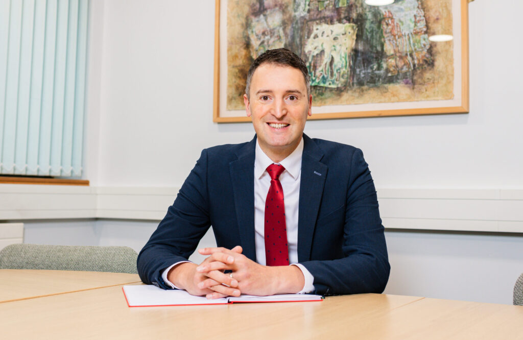 Principal Mr David Castles at his desk