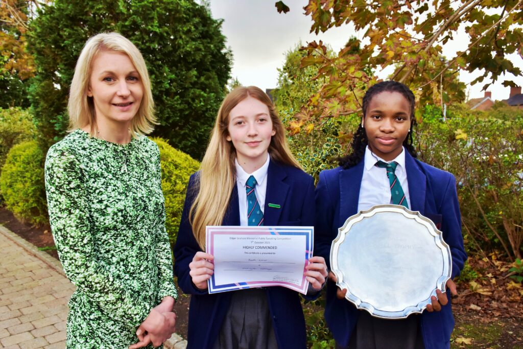 Miss Stevenson with 2 students who had success at the public speaking competition